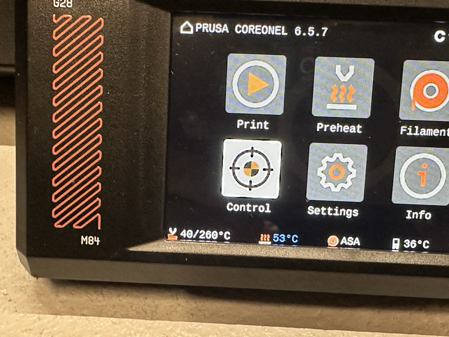 Prusa Core One L's display, showing 40/260C temperature after print.